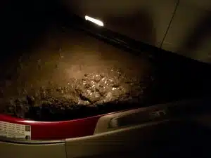 Nighttime View of a Car Door Stuck in Mud