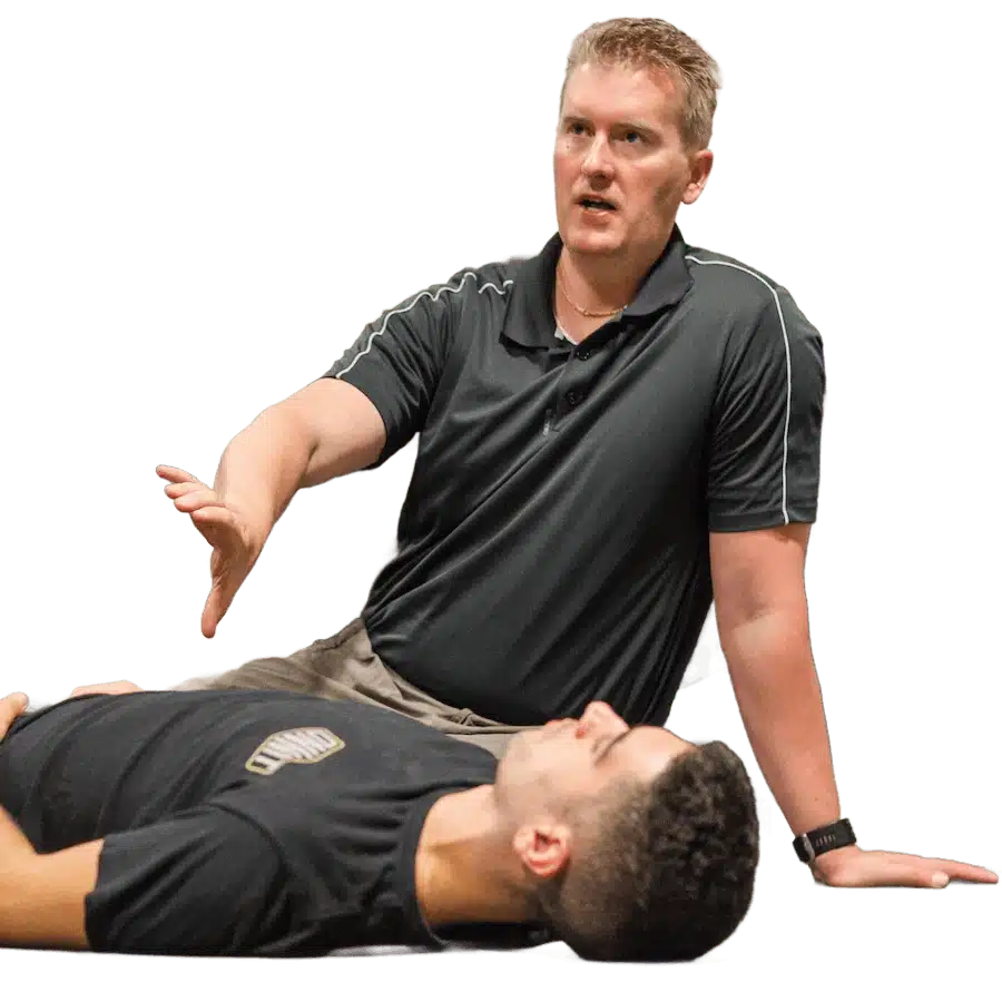 Dr Mike T Nelson Lying down with Client while demonstrating